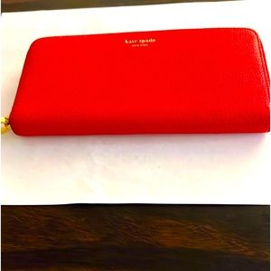 Kate Spade large continental red current 12 credit card slot wallet.